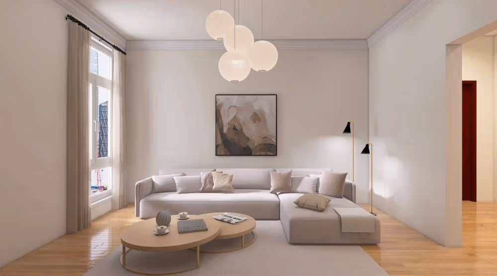 Sofa earth tone minimalis di ruang tamu dengan pemandangan alam